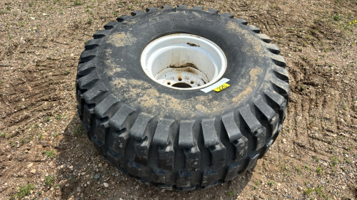Goodyear 21.5L-16.1SL tire on rim