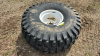 Goodyear 21.5L-16.1SL tire on rim