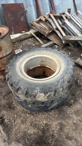 2- 10.00-20 tires on steel rims