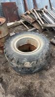 2- 10.00-20 tires on steel rims