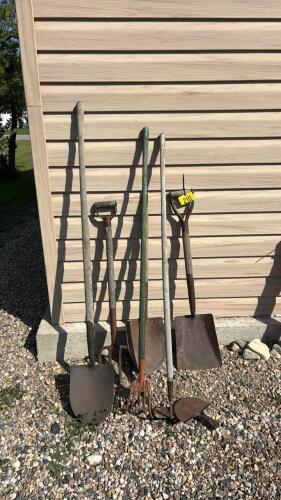 Assorted shovels and yard tools