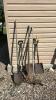 Assorted shovels and yard tools