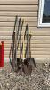 Assorted shovels and yard tools