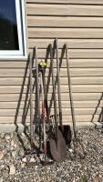 Assorted spades and yard tools