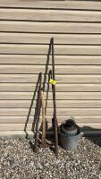 Assorted bars and pick axe