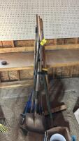 Assorted shovels and yard tools