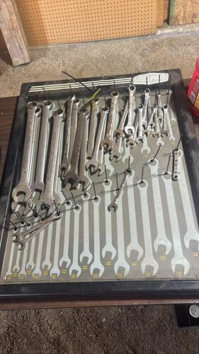 Assorted flat wrenches, organizer