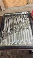 Assorted flat wrenches, organizer