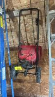 Grass seed spreader