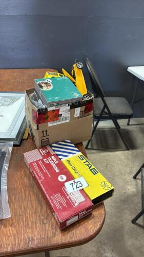Assorted masks and gun cleaners