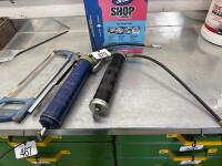 2 grease guns and hack saw