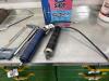 2 grease guns and hack saw