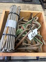 Assortment of hooks and large spikes
