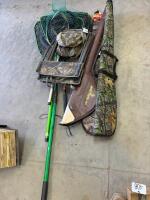 Fishing nets, gun cases, chair