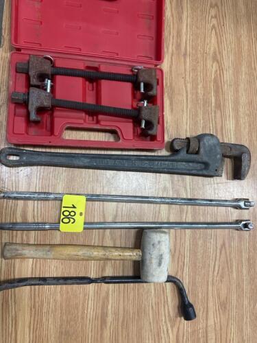 Pipe wrench, breaking bars, coil spring tool