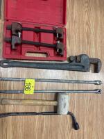 Pipe wrench, breaking bars, coil spring tool