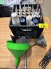 Assortment of caulking, paint and funnels