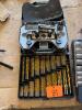 Drill bits and diamond grit hole saw