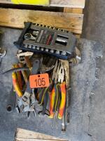 Assortment of pliers and socket set