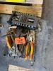 Assortment of pliers and socket set