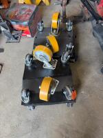 4- caster wheels and 4- shop dollies