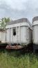Tridem end dump trailer