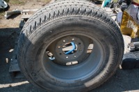 Bridgestone LT265/70R17 tire on 8 bolt rim