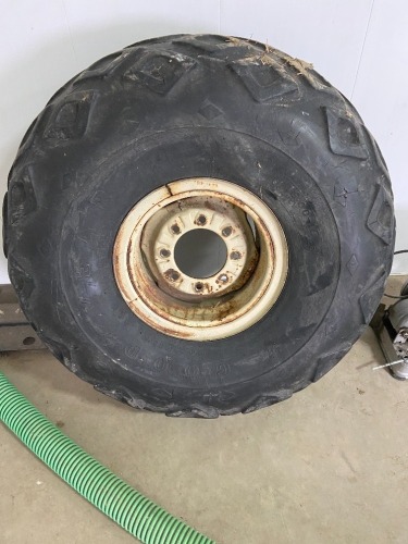 2 - Goodyear 16.00 - 16 tires on 8 bolt rims