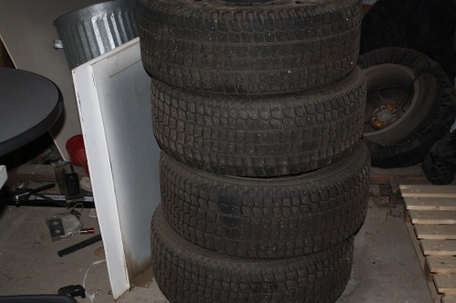 4 - Firestone Firehawk winter tires on interceptor rims 235/55/17. Bid is per tire- must take 4 tires