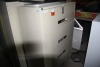 4 drawer file cabinet 36" wide x 18" deep x 52" high w/ padlock locking