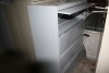 4 drawer file cabinet 36" wide x 18" deep x 52" high w/ flip up front