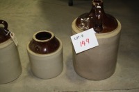 2 stoneware jugs (large one has chip in top)& stoneware cannister