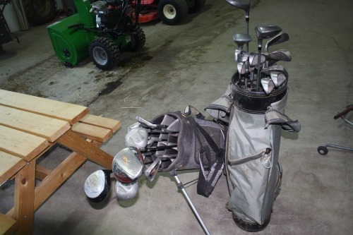 2 sets of right handed golf clubs & bags