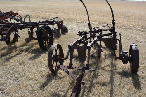 3 furrow plow w/ steel wheels