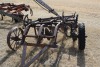 4 furrow plow w/ steel wheels
