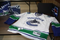 T48 - Vancouver Canucks 2015 -16 team signed jersey, book, picture