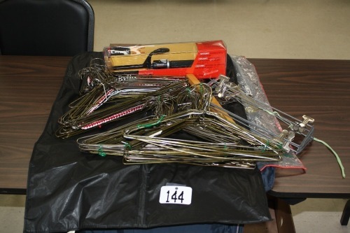 T144-5 garment bags, hangers and curling iron