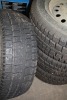 4 - COOPER WINTER TIRES 245/65/17 ON BLACK 5 BOLT RIMS (OFF JEEP) 95% TREAD - 2