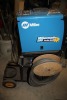 MILLER MILLERMATIC 180 AUTO-SET MIG WELDER W/ LONG EXT. CORD, COVER ON ROLLING STAND - 2