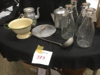 milk jugs, coffee pots, colander