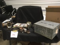 tin box, door hardware, grinder, fry pan, papers
