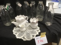 milk jugs, tea pot, cream & sugar