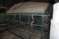 6' X 10' GREENHOUSE W/ VENTED CEILING, METAL 6' 3 SHELF STAND, COMES W/ 2 X 8 TREATED WOOD BASE