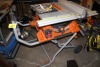 RIDGID 10" TABLE SAW MODEL R4510 ON ROLLING STAND